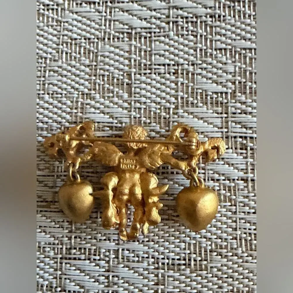 Kirks Folly cherub brooch
